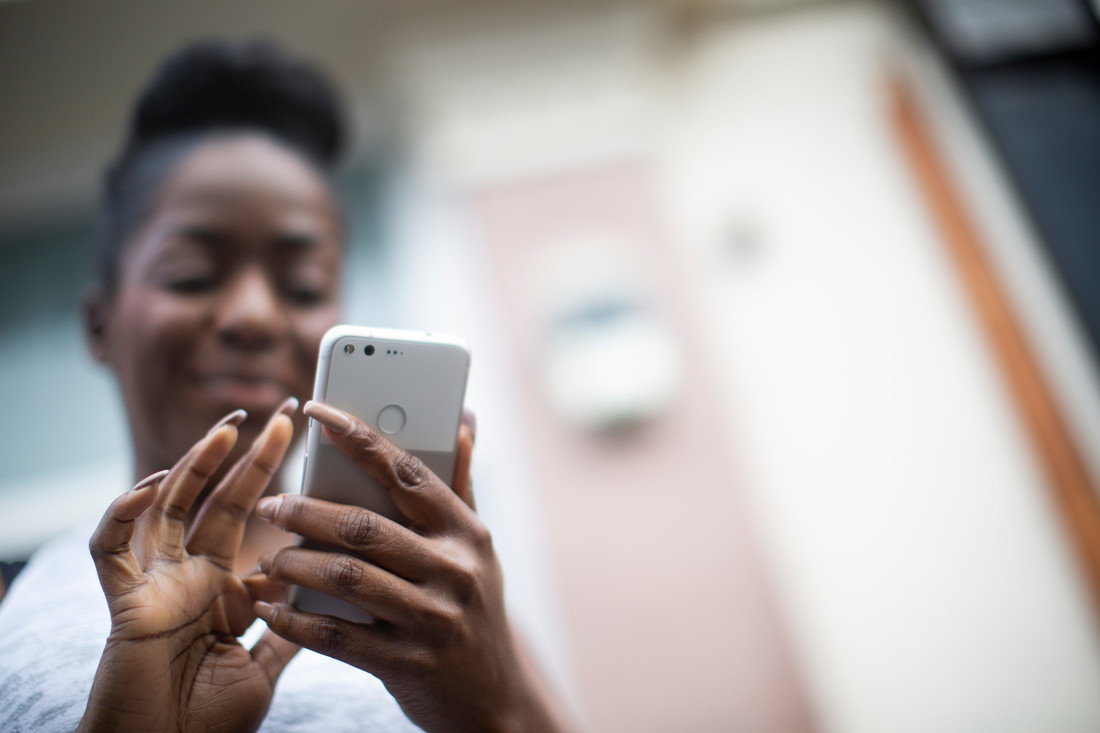 Woman looking at her mobile phone