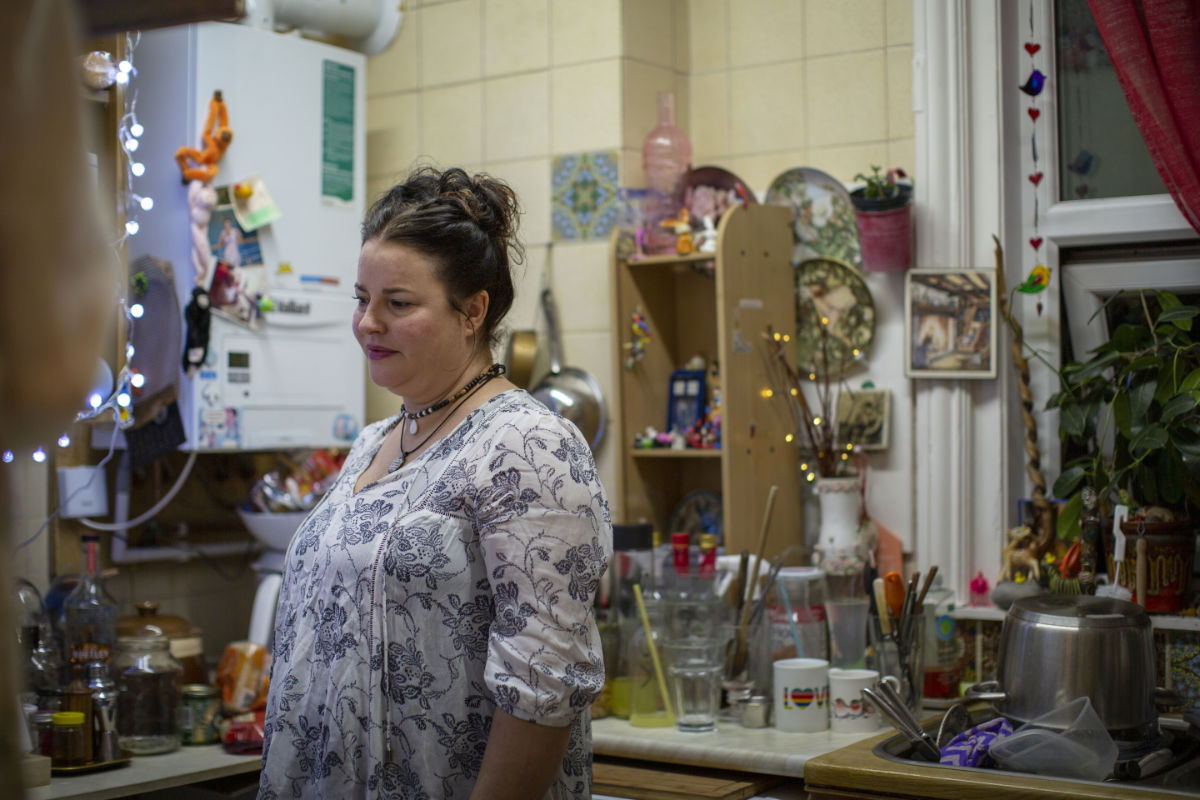 Image of a woman in her kitchen